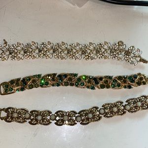 Three designer bracelets